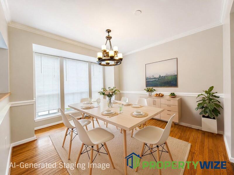 Natural light fills this Woodland Village home! Features garage parking, master suite, updated 2 full baths at top floor and powder room at 1st floor. property image