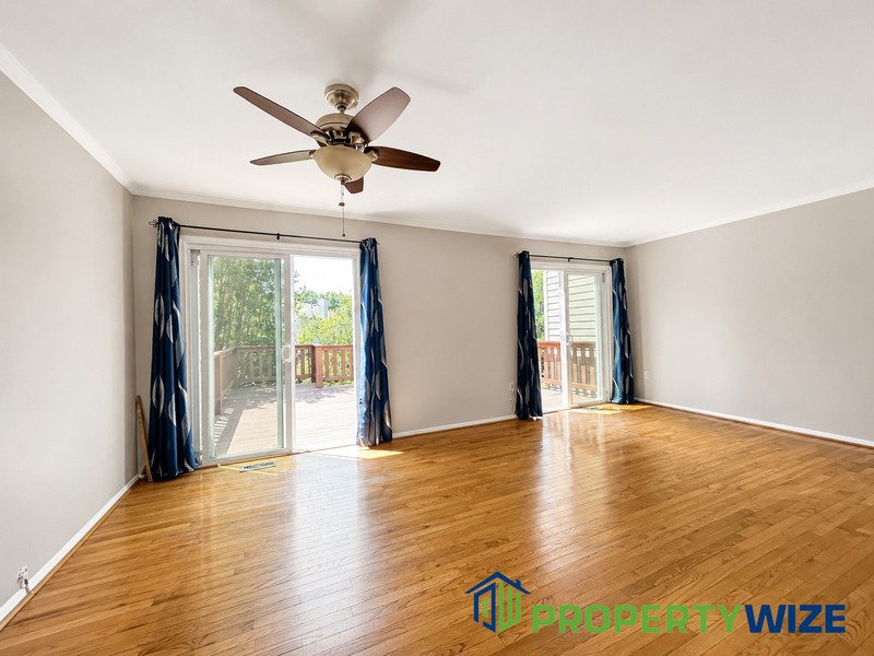 Natural light fills this Woodland Village home! Features garage parking, master suite, updated 2 full baths at top floor and powder room at 1st floor. property image