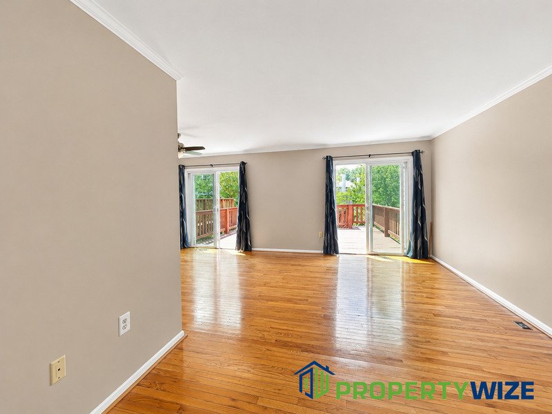 Natural light fills this Woodland Village home! Features garage parking, master suite, updated 2 full baths at top floor and powder room at 1st floor. property image