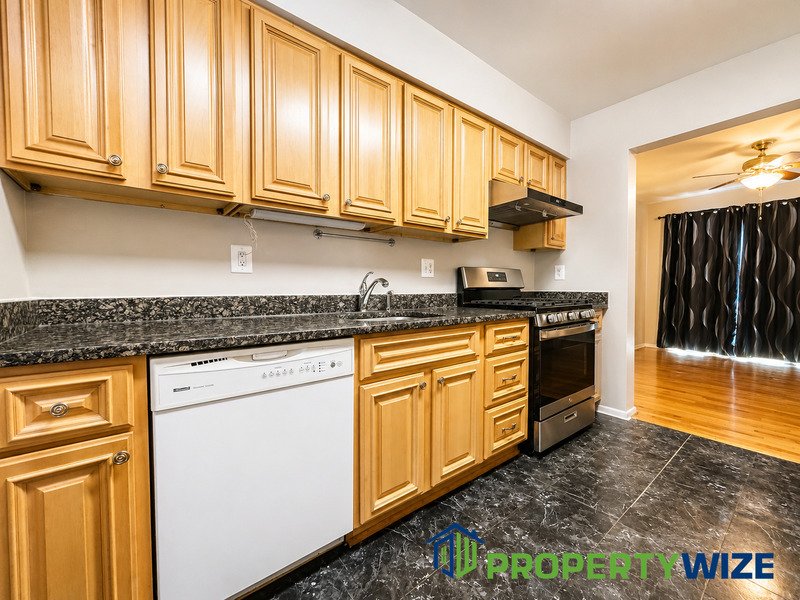 Natural light fills this Woodland Village home! Features garage parking, master suite, updated 2 full baths at top floor and powder room at 1st floor. property image
