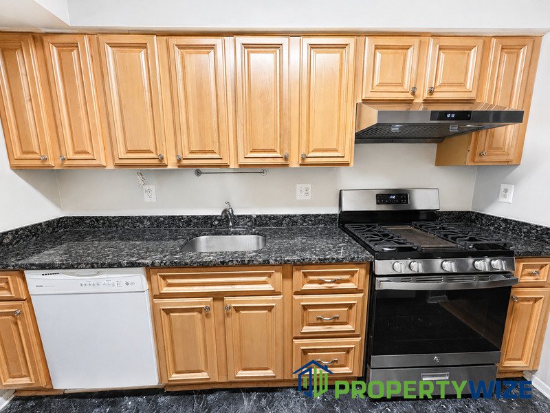 Natural light fills this Woodland Village home! Features garage parking, master suite, updated 2 full baths at top floor and powder room at 1st floor. property image