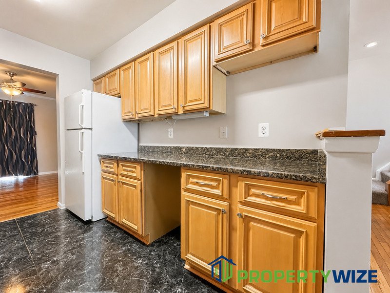 Natural light fills this Woodland Village home! Features garage parking, master suite, updated 2 full baths at top floor and powder room at 1st floor. property image