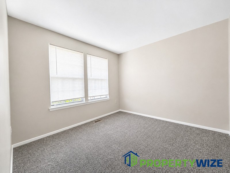 Natural light fills this Woodland Village home! Features garage parking, master suite, updated 2 full baths at top floor and powder room at 1st floor. property image