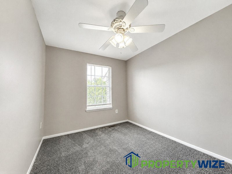 Natural light fills this Woodland Village home! Features garage parking, master suite, updated 2 full baths at top floor and powder room at 1st floor. property image