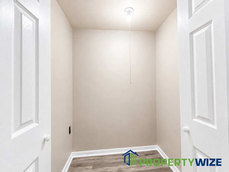 Natural light fills this Woodland Village home! Features garage parking, master suite, updated 2 full baths at top floor and powder room at 1st floor. property image