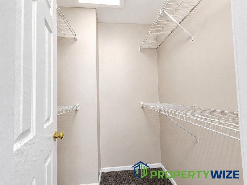Natural light fills this Woodland Village home! Features garage parking, master suite, updated 2 full baths at top floor and powder room at 1st floor. property image