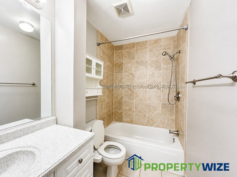 Natural light fills this Woodland Village home! Features garage parking, master suite, updated 2 full baths at top floor and powder room at 1st floor. property image