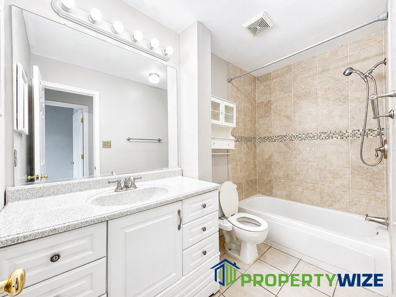 Natural light fills this Woodland Village home! Features garage parking, master suite, updated 2 full baths at top floor and powder room at 1st floor. property image