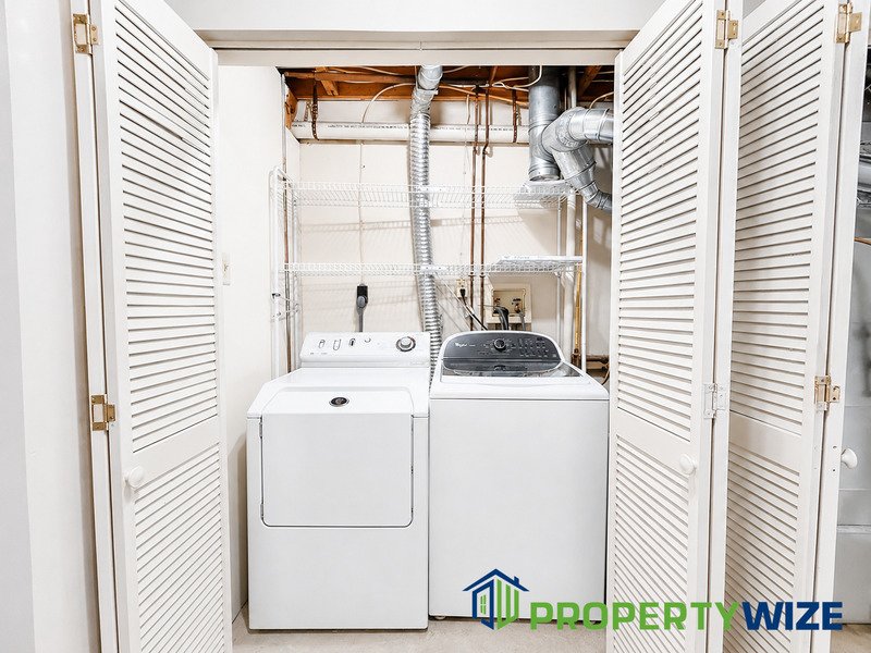 Natural light fills this Woodland Village home! Features garage parking, master suite, updated 2 full baths at top floor and powder room at 1st floor. property image