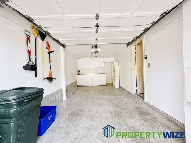 Natural light fills this Woodland Village home! Features garage parking, master suite, updated 2 full baths at top floor and powder room at 1st floor. property image