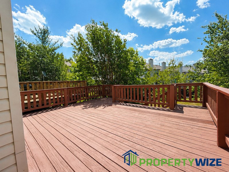 Natural light fills this Woodland Village home! Features garage parking, master suite, updated 2 full baths at top floor and powder room at 1st floor. property image