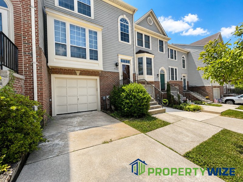 Natural light fills this Woodland Village home! Features garage parking, master suite, updated 2 full baths at top floor and powder room at 1st floor. property image
