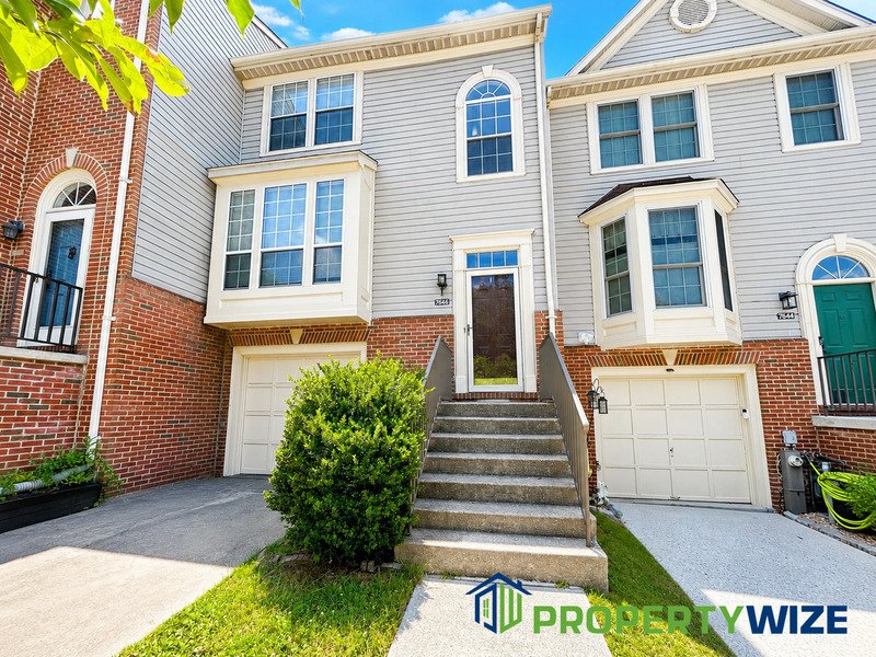 Natural light fills this Woodland Village home! Features garage parking, master suite, updated 2 full baths at top floor and powder room at 1st floor. property image
