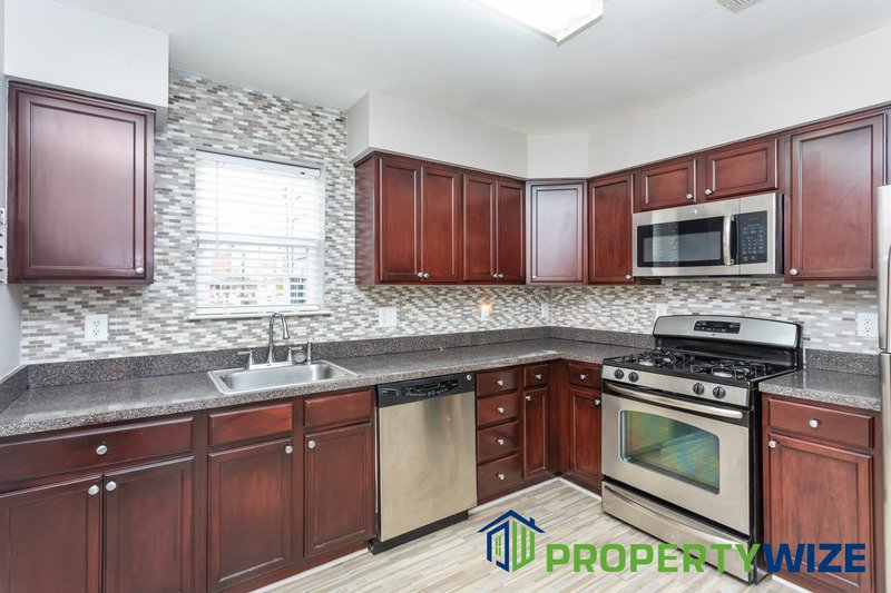 This renovated 3-bedroom, 2-bathroom townhome has all the bells and whistles. property image